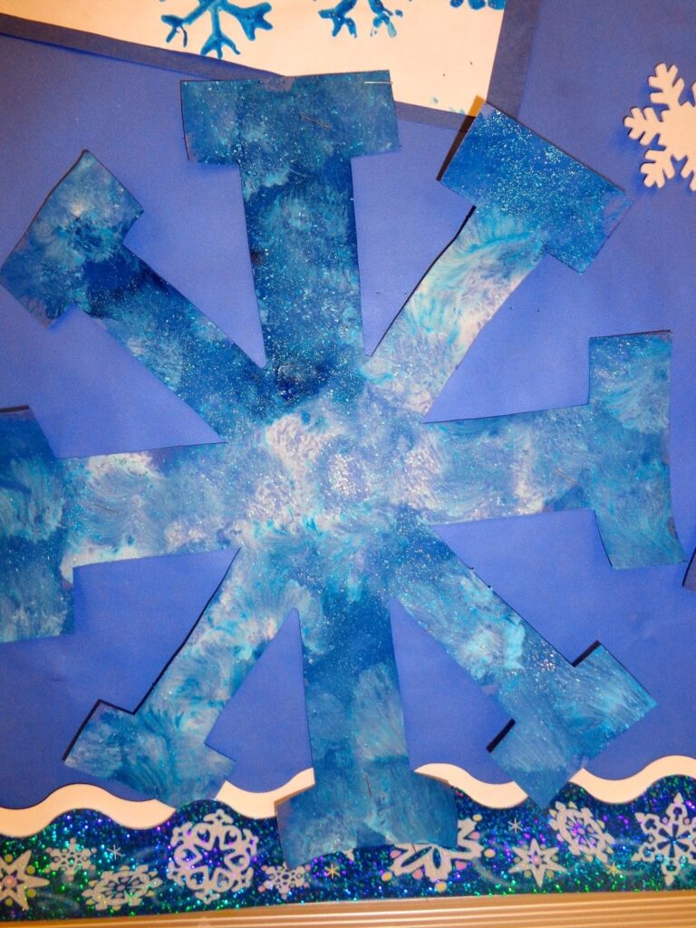 Blue snowflake with glitter cutout